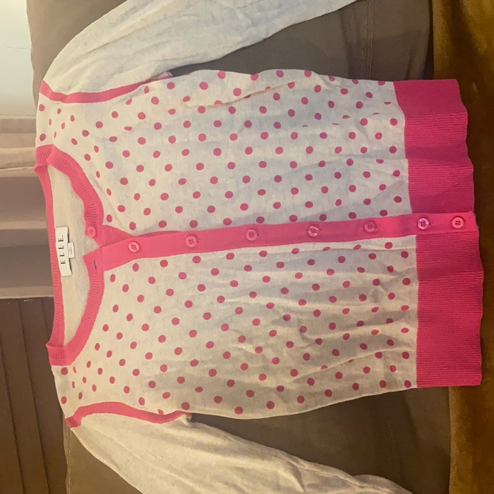 Nic never worn cardigan.